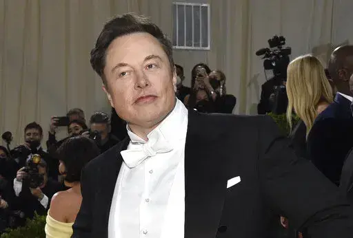 Elon Musk attends The Metropolitan Museum of Art's Costume Institute benefit gala celebrating the opening of the "In America: An Anthology of Fashion" exhibition on May 2, 2022, in New York. Musk is expected to meet with Twitter employees Thursday, June 16, 2022 in an apparent effort to assuage concerns about his $44 billion deal to acquire the social platform. (Photo by Evan Agostini/Invision/AP)