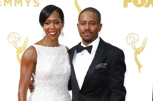 Regina King, left, and Ian Alexander Jr. arrive at the 67th Primetime Emmy Awards on Sunday, Sept. 20, 2015, at the Microsoft Theater in Los Angeles. Ian Alexander Jr., the only child of award-winning actor and director Regina King, has died.  The death was confirmed Saturday, Jan. 22,2022 in a family statement. (Photo by Danny Moloshok/Invision for the Television Academy/AP Images, File)