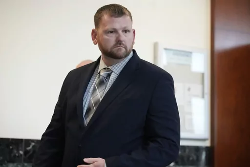 Former Aurora, Colo., Police Department officer Randy Roedema leaves the courtroom after he was convicted of charges in the 2019 death of Elijah McClain after a trial in the Adams County, Colo., courthouse Thursday, Oct. 12, 2023, in Brighton, Colo. (AP Photo/David Zalubowski)