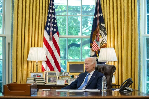 President Joe Biden listens to a question during an interview with the Associated Press in the Oval Office of the White House, June 16, 2022, in Washington.  Biden’s top political advisers are bracing for big midterm losses in November. They know that the party holding the White House nearly always losses congressional seats in the first midterm election of a new presidency. (AP Photo/Evan Vucci, File)