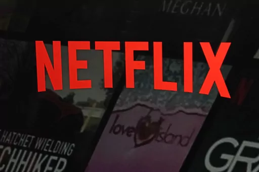 The Netflix logo is shown in this photo from the company's website, in New York, Feb. 2, 2023. Since late last century and the early days of the web, providers of digital media like Netflix and Spotify have had a free pass when it comes to international taxes on films, video games and music that are shipped across borders through the internet. But now, a global consensus on the issue may be starting to crack. (AP Photo/Richard Drew, File)
