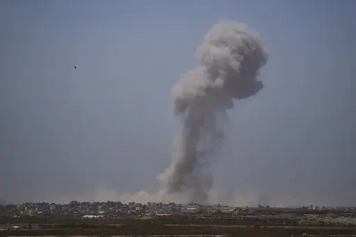 Smoke billows after an explosion in the Gaza Strip, as seen from southern Israel on May 21, 2024. (AP Photo/Leo Correa, File)