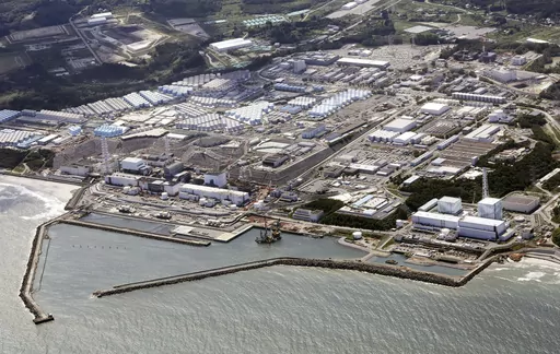 This aerial view shows the Fukushima Daiichi nuclear power plant, situated in coastal towns of both Okuma and Futaba, northeastern Japan, on Aug. 24, 2023, shortly after its operator Tokyo Electric Power Company Holdings TEPCO began releasing its first batch of treated radioactive water into the Pacific Ocean. Japan said Sunday, March 31, 2024, its experts have held talks with their Chinese counterparts to try to assuage Beijing’s concerns over the discharge of treated radioactive wastewater f