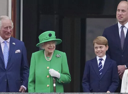 From left, Prince Charles, Queen Elizabeth II, Prince George and Prince William appear on the balcony of Buckingham Palace during the Platinum Jubilee Pageant outside Buckingham Palace in London, Sunday June 5, 2022.  After four days of parades, street parties and a gala concert celebrating Queen Elizabeth II's 70 years on the throne, the Platinum Jubilee ended Sunday with the crowd outside Buckingham Palace singing "God Save the Queen." But as the tributes to the queen's lifetime of service be