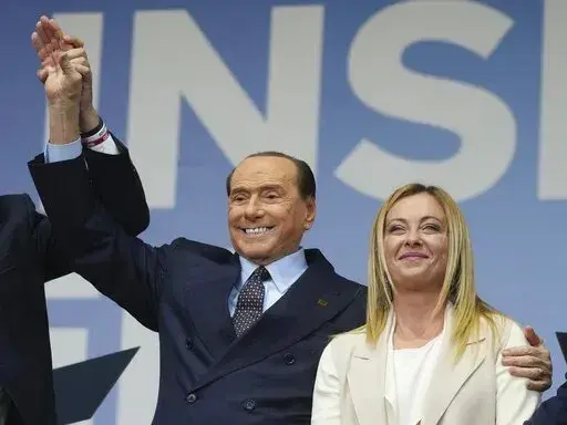Forza Italia's Silvio Berlusconi, and Brothers of Italy's Giorgia Meloni attend the center-right coalition closing rally in Rome Thursday, Sept. 22, 2022. The resounding victory by far-right leader Giorgia Meloni in Sept. 25 elections for Parliament isn't sitting well with Silvio Berlusconi, the former three-time conservative premier who, 40 years her senior, fancies himself the elder statesman of Italy's political right. (AP Photo/Gregorio Borgia, File)
