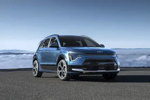 This photo provided by Kia shows the Niro Plug-in Hybrid. This plug-in version of Kia's small crossover SUV can drive an estimated 33 miles on electric power before switching to gas and getting 48 mpg. (Courtesy of Kia America via AP)