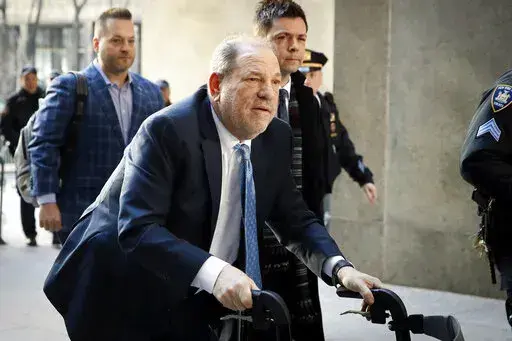 Harvey Weinstein arrives at a Manhattan courthouse as jury deliberations continue in his rape trial in New York, on Feb. 24, 2020. A New York appellate court on Thursday, June 2, 2022, has upheld Weinstein's rape conviction, rejecting the disgraced movie mogul's claims that the judge at the landmark #MeToo trial prejudiced him by allowing women to testify about allegations that weren't part of the criminal case. (AP Photo/John Minchillo, File)