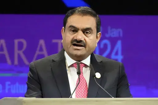 India's Adani Group Chairman Gautam Adani addresses the Vibrant Gujarat Global Summit in Gandhinagar, India, Jan.10, 2024. (AP Photo/Ajit Solanki, File)