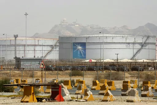 Storage tanks are seen at the North Jiddah bulk plant, an Aramco oil facility, in Jiddah, Saudi Arabia, on March 21, 2021. Saudi Arabia said Thursday, Aug. 3, 2023, it will extend its unilateral production cut of 1 million barrels of oil a day through the end of September in its effort to boost flagging energy prices. (AP Photo/Amr Nabil, File)