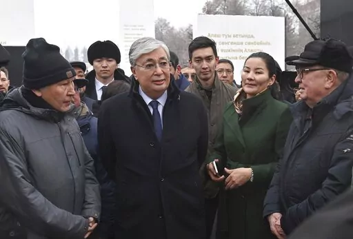 Kazakhstan President Kassym-Jomart Tokayev speaks in Almaty, Kazakhstan, on Friday, Dec. 23, 2022, at an unveiling of a memorial to those killed in January 2022 in the worst unrest in the Central Asian country’s three decades of independence. The photo was released by his Presidential Press Service. Words on the memorial speak of the need for unity and harmony in the former Soviet country of 19 million, but a year after calm was restored and a state of emergency lifted on Jan. 20, 2022, both a