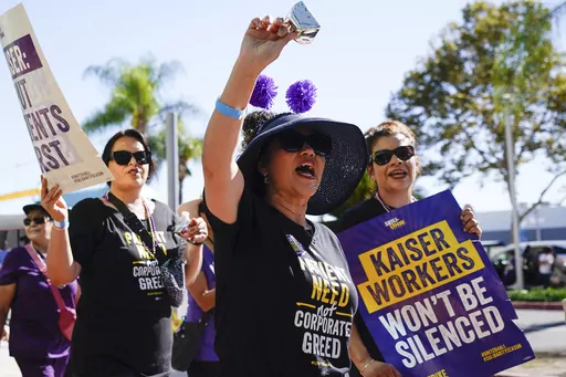 Kaiser Permanent workers picket Thursday, Oct. 5, 2023, in Baldwin Park, Calif. Some 75,000 Kaiser Permanente hospital employees who say understaffing is hurting patient care walked off the job in five states and the District of Columbia, kicking off a major health care worker strike.(AP Photo/Ryan Sun)