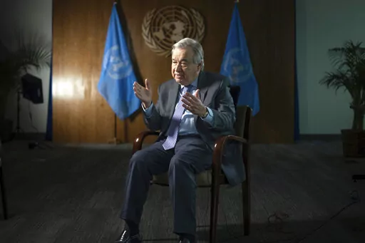 United Nations Secretary-General Antonio Guterres speaks during interview at the UN Headquarters, Thursday, Jan. 20, 2022, in New York. As he starts his second term as U.N. secretary-general, Antonio Guterres said Thursday the world is worse in many ways than it was five years ago because of the COVID-19 pandemic, the climate crisis and geopolitical tensions that have sparked conflicts everywhere -- but unlike U.S. President Joe Biden he thinks Russia will not invade Ukraine.(AP Photo/Robert Bum