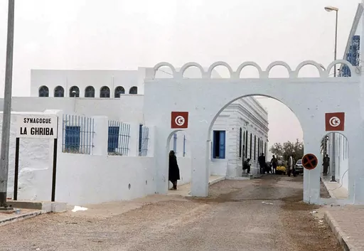 Ghriba synagogue is seen in Djerba, Tunisia, April 12, 2002. The Tunisian Interior Ministry says a naval guard shot and killed a colleague and two civilians Tuesday, May 9, 2023, near the synagogue during an annual Jewish pilgrimage. (AP Photo/Hassene Dridi, File)