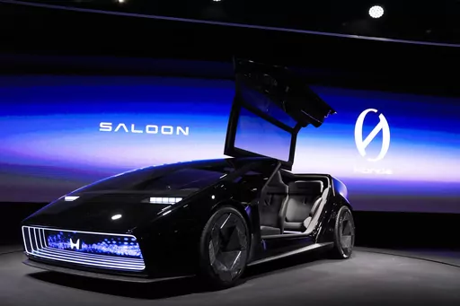 The newly unveiled concept car, Honda Zero Series "Saloon" electric vehicle is displayed during a Honda news conference during the CES tech show Tuesday, Jan. 9, 2024, in Las Vegas. Taking design cues from seemingly everything from a ground-hugging sports car to a 1980s-era Dustbuster vacuum cleaner, the Honda Saloon concept vehicle is a hint at the Japanese automaker’s EV strategy and upcoming designs. (AP Photo/Ryan Sun, File)