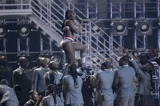 Doechii, center, performs a medley during the 67th annual Grammy Awards on Sunday, Feb. 2, 2025, in Los Angeles. (AP Photo/Chris Pizzello)