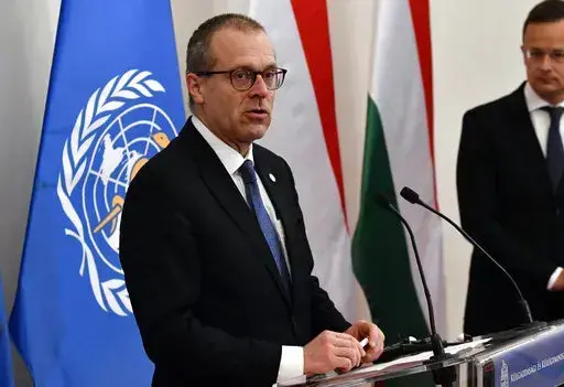 Hans Kluge, Regional Director for Europe at the World Health Organization (WHO) hold a press conference with Hungarian Minister of Foreign Affairs and Trade Peter Szijjarto, right, at the Ministry of Foreign Affairs and Trade in Budapest, April 21, 2021. The director of the World Health Organization’s Europe office said the continent is now facing a “plausible endgame” to the pandemic and that the number of coronavirus deaths is now starting to plateau. During a press briefing on Thursday,