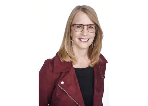 This undated file photo provided by NerdWallet shows Liz Weston, a columnist for personal finance website NerdWallet.com. Unfortunately, some of the people who know the most about money are the worst at talking about it. They use too much jargon and forget what it’s like to be a beginner. (NerdWallet via AP, File)