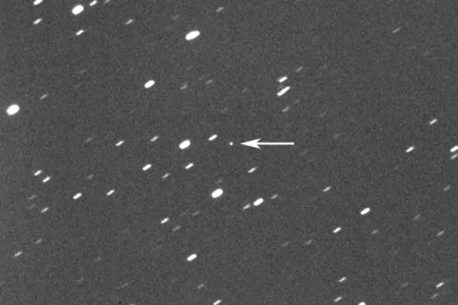 This photo provided by Gianluca Masi shows asteroid 2023 DZ2, indicated by arrow at center, about 1.8 million kilometers (1.1 million miles) away from the Earth on March 22, 2023. On Saturday, March 25, 2023, the asteroid, big enough to wipe out a city, will harmlessly zip between Earth and the moon. While asteroid flybys are common, NASA said it’s rare for one so big to come so close _ about once a decade. Scientists estimate its size somewhere between 140 feet and 310 feet. (42 meters and 94