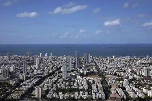 A general view shows the center of Tel Aviv, Israel, Thursday, Dec. 2, 2021. Prime Minister Benjamin Netanyahu has vowed to shut down Al Jazeera’s operations in Israel, calling it a “terror channel” that spreads incitement, after parliament passed a law clearing the way for the closure. (AP Photo/Oded Balilty, File)