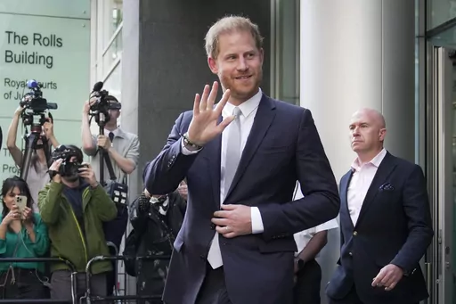 Prince Harry leaves the High Court after giving evidence in London, Wednesday, June 7, 2023. A London judge has allowed Prince Harry's lawsuit against the publisher of The Sun tabloid to go to trial on claims the newspaper used unlawful methods to gather information about him. (AP Photo/Kin Cheung, File)
