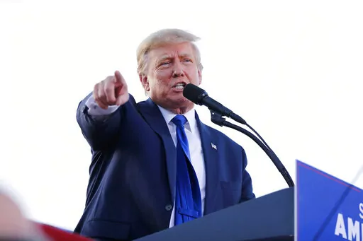 Former President Donald Trump speaks at a rally at the Delaware County Fairgrounds, April 23, 2022, in Delaware, Ohio. With Trump focused on solidifying his reputation as a GOP kingmaker ahead of another potential presidential run, some allies say the Ohio victory could encourage him to step up his involvement in other bitter primary fights from Arizona to Missouri. (AP Photo/Joe Maiorana, File)