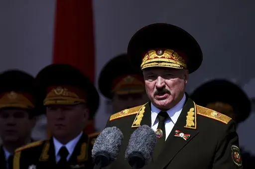 President Alexander Lukashenko of Belarus gives a speech during a military parade in Minsk, Belarus, on May 9, 2020, that marked the anniversary of the defeat of Nazi Germany in World War II. Lukashenko, who marks 30 years in power on Saturday, is one of the world's longest-serving and most ruthless leaders. (Pool Photo via AP, File)