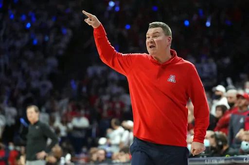 Arizona coach Tommy Lloyd reacts to a play during the second half of the team's NCAA college basketball game against Oregon, Saturday, Feb. 19, 2022, in Tucson, Ariz. Arizona won 84-81. (AP Photo/Rick Scuteri)