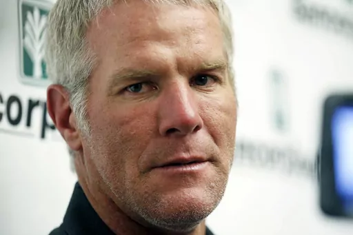 Former NFL quarterback Brett Favre speaks with reporters prior to his induction to the Mississippi Hall of Fame in Jackson, Miss., Aug. 1, 2015. Mississippi Attorney General Lynn Fitch sued Mississippi Auditor Shad White on Thursday, Feb. 22, 2024, saying the auditor is encroaching on the attorney general's power to try to recover misspent welfare money from Favre. (AP Photo/Rogelio V. Solis, File)