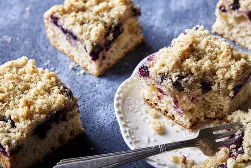 This image released by Milk Street shows a recipe for German blueberry streusel cake. (Milk Street via AP)