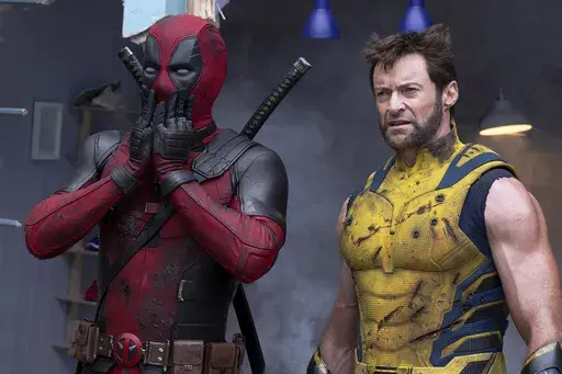 This image released by 20th Century Studios/Marvel Studios shows Ryan Reynolds as Deadpool/Wade Wilson, left, and Hugh Jackman as Wolverine/Logan in a scene from "Deadpool & Wolverine." (20th Century Studios/Marvel Studios via AP)