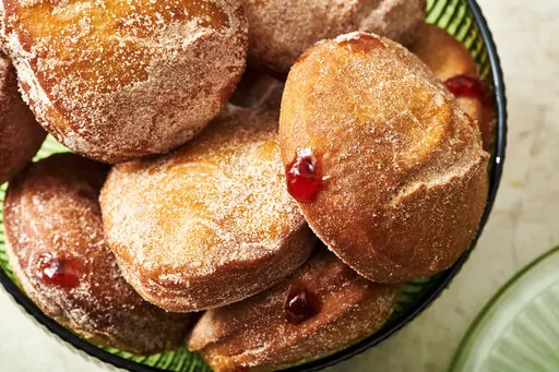 A plate of jelly doughnuts are displayed in New York on Nov. 15, 2021. In Jewish homes, jelly doughnuts are often enjoyed during Hanukkah and are known as Sufganiyot. (Cheyenne Cohen via AP)