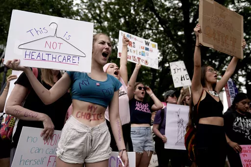 People rally in support of abortion rights, July 2, 2022, in Kansas City, Mo. Legislative efforts in Missouri and Mississippi this week are attempting to prevent voters from having a say over abortion rights, building on anti-abortion strategies seen in other states, including last year in Ohio. (AP Photo/Charlie Riedel, File)