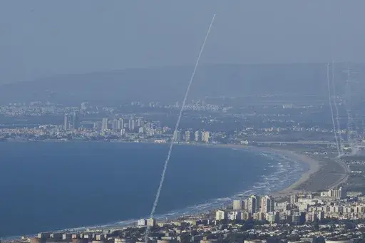 Israeli Iron Dome air defense system fires to intercept rockets that were launched from Lebanon, in northern Israel, Monday, Sept. 23, 2024. (AP Photo/Baz Ratner)