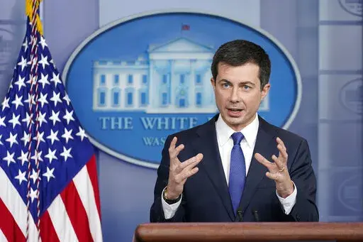Transportation Secretary Pete Buttigieg speaks during the daily briefing at the White House in Washington, on Nov. 8, 2021. Buttigieg is vowing help to stem a rising U.S. epidemic of car fatalities with a broad-based government strategy aimed at limiting the speed of cars, redesigning roads to better protect bicyclists and pedestrians and boosting car safety features such as automatic emergency braking. Buttigieg indicated to The Associated Press that new federal data being released next week wi