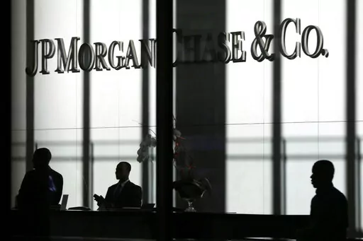 The JPMorgan Chase & Co. logo is displayed at their headquarters in New York on Oct. 21, 2013. You'll no longer be able to store your precious coins, jewelry and paperwork at JPMorgan Chase & Co., as the bank has stopped opening new safety deposit boxes for customers. A spokesman for the bank said Chase decided late last year to stop offering new deposit boxes to customers as a “business decision” but declined to share specifics. (AP Photo/Seth Wenig, File)