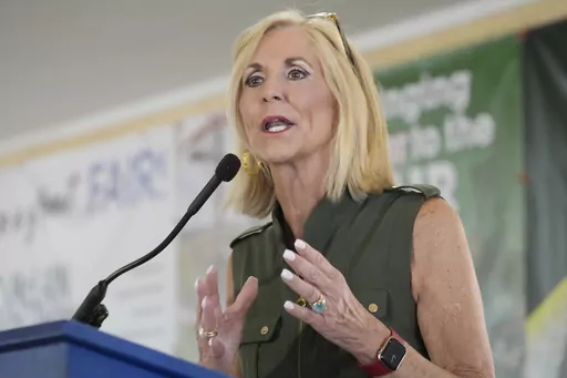 Mississippi Republican Attorney General Lynn Fitch addresses the crowd at the Neshoba County Fair in Philadelphia, Miss., July 26, 2023. A court ruling striking down Mississippi's practice of permanently stripping voting rights from people convicted of certain felonies should be reconsidered and reversed, the state said Friday, Aug. 18, 2023, as it asked for new hearing by the 5th U.S. Circuit Court of Appeals. Enforcement of the voting ban, which is part of the state's constitution, was blocked