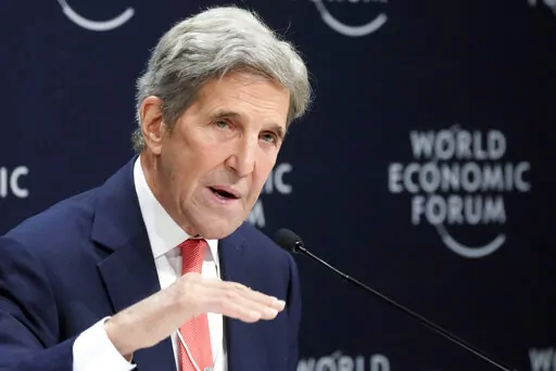 John F. Kerry, Special Presidential Envoy for Climate of the United States, gestures during a news conference at the World Economic Forum in Davos, Switzerland, May 24, 2022. Kerry said Friday, July 1, that setbacks for President Joe Biden's climate efforts at home have “slowed the pace” of some of the commitments from other countries to cut climate-wrecking fossil fuels, but he insisted the U.S. would still achieve its own ambitious national climate goals in time. (AP Photo/Markus Schreiber