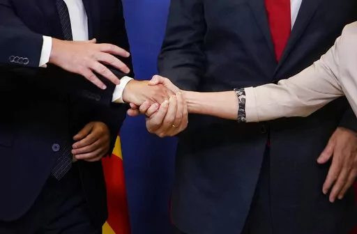 European Commission President Ursula von der Leyen, right, shakes hands with Albanian Prime Minister Edi Rama, North Macedonia's Prime Minister Dimitar Kovacevski and Czech Republic's Prime Minister Petr Fiala prior to a meeting at EU headquarters in Brussels, Tuesday, July 19, 2022. Leaders from more than 40 countries will gather Thursday, Oct. 6, 2022, in Prague, to launch a "European Political Community" aimed at boosting security and economic prosperity across the continent, but critics clai