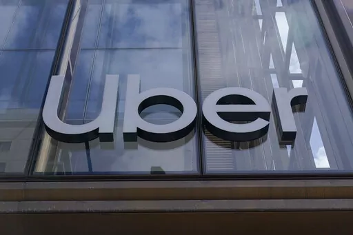 An Uber sign is displayed at the company's headquarters in San Francisco, Monday, Sept. 12, 2022. Uber said Thursday, Sept. 15, that it reached out to law enforcement after a hacker apparently breached its network. A security engineer said the intruder provided evidence of obtaining access to crucial systems at the ride-hailing service. (AP Photo/Jeff Chiu, File)