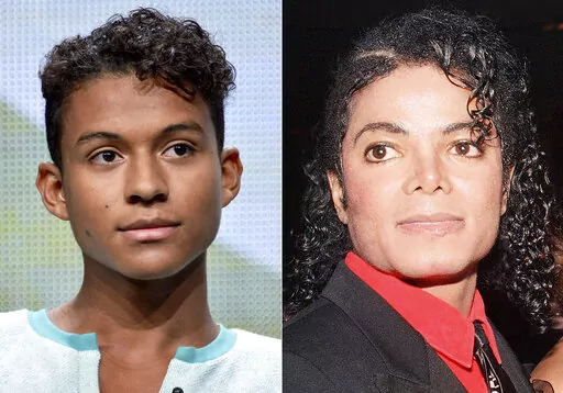 Jaafar Jackson appears during the "Living with The Jacksons" panel at the Reelz Channel 2014 Summer TCA in Beverly Hills, Calif., on July 12, 2014, left, and Michael Jackson appears at the American Cinema Award gala in Beverly Hills, Calif., on Jan. 9, 1987. Michael Jackson's 26-year-old nephew, Jaafar, will play the King of Pop in a planned biopic to be directed by Antoine Fuqua. (AP Photo)