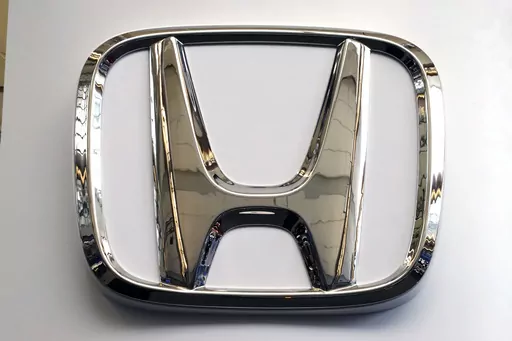 FILE- This Feb. 14, 2019 file photo shows a Honda logo at the 2019 Pittsburgh International Auto Show in Pittsburgh. Honda is recalling a half-million vehicles in the U.S. and Canada, Wednesday, March 15, 2023, because the front seat belts may not latch properly. The recall covers some of the the automaker’s top-selling models including the 2017 through 2020 CR-V, the 2018 and 2019 Accord, the 2018 through 2020 Odyssey and the 2019 Insight. Also included is the Acura RDX from the 2019 and 2020