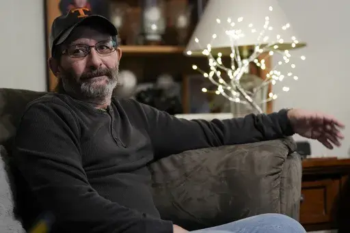 Jerry Barnett reflects on the life of his wife, Sibrina Barnett, Nov. 22, 2024, in Johnson City, Tenn. Barnett's wife died trying to escape flood waters caused by Hurricane Helene in September, near the plastics factory where she cleaned offices once a week. (AP Photo/George Walker IV)
