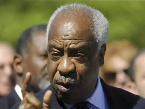 In this undated photo former Del. Rev. Emmett C. Burns Jr. speaks in Annapolis, Md. Burns, a civil rights leader in Maryland who also served in the General Assembly for 20 years, has died at age 81. Del. Benjamin Brooks Sr., who succeeded Burns in the legislature, told The Baltimore Sun that Burns died Thursday, March 17, 2022, at Sinai Hospital in Baltimore from complications of a fall.   (Barbara Haddock Taylor/The Baltimore Sun via AP)