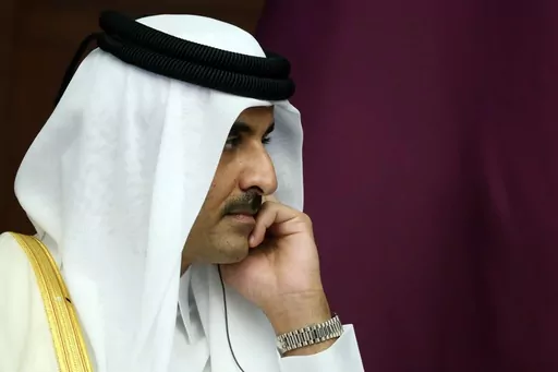 The Emir of Qatar, Sheikh Tamim bin Hamad Al Thani reacts during a meeting, in Astana, Kazakhstan, Thursday, Oct. 13, 2022. Sheikh Tamim bin Hamad Al Thani, channeled the wider anger in the Arab world over Israel's unrelenting airstrikes and siege of the Gaza Strip that the Hamas-controlled Health Ministry says has killed over 5,000 people so far. (Vyacheslav Prokofyev, Sputnik, Kremlin Pool Photo via AP, File)