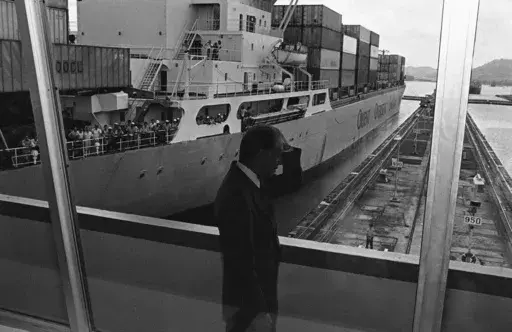 President Jimmy Carter views the Panama Canal at the Miraflores Locks in Canal Zone on June 17, 1978. On Friday Carter signed the final Panama Canal Treaties giving control of the canal to Panama in 2000. (AP Photo/Tasnadi, File)
