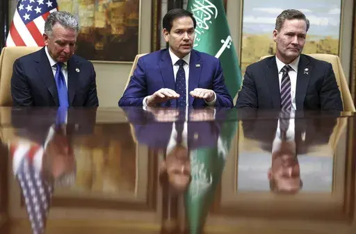 U.S. Secretary of State Marco Rubio, U.S. National Security Advisor Mike Waltz and U.S. Middle East envoy Steve Witkoff attend an interview after meeting with Russian Foreign Minister Sergei Lavrov and Russian President Vladimir Putin's foreign policy advisor Yuri Ushakov, at Diriyah Palace, in Riyadh, Saudi Arabia, Tuesday, Feb. 18, 2025. (Evelyn Hockstein/Pool Photo via AP)