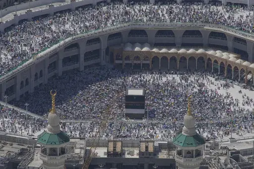 Muslim pilgrims circumambulate the Kaaba, the cubic building at the Grand Mosque, during the annual Hajj pilgrimage in Mecca, Saudi Arabia, Monday, June 17, 2024. More than 1,000 people died during this year’s Hajj pilgrimage in Saudi Arabia as the faithful faced extreme high temperatures at Islamic holy sites in the desert kingdom, officials said Sunday, June 23, 2024. (AP Photo/Rafiq Maqbool, File)