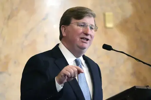 Mississippi Republican Gov. Tate Reeves delivers his State of the State address to the Mississippi State Legislature, Feb. 26, 2024, at the state Capitol in Jackson, Miss. Reeves has signed a new law Tuesday, March 12, that will allow women to receive Medicaid coverage earlier in pregnancy. (AP Photo/Rogelio V. Solis, File)