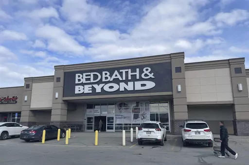 The entrance to a Bed Bath & Beyond store is seen in Anchorage, Alaska, on Sunday, April 23, 2023. One of the original big box retailers, the company filed for bankruptcy protection on Sunday, following years of dismal sales and losses and numerous failed turnaround plans. (AP Photo/Mark Thiessen)