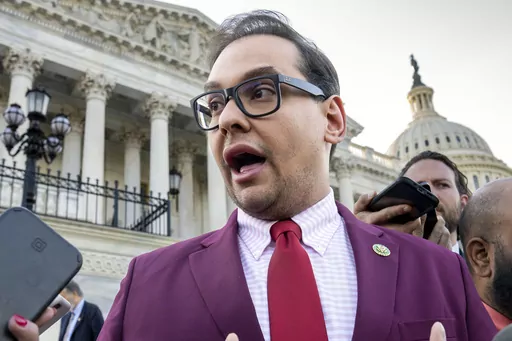 U.S. Rep. George Santos, R-N.Y., speaks to reporters outside the Capitol, in Washington, May 17, 2023. Santos, charged with a host of financial crimes, including embezzling money from his campaign, withdrew $85,000 from his campaign to help repay hundreds of thousands of dollars he loaned himself to get elected in 2022. (AP Photo/J. Scott Applewhite, File)